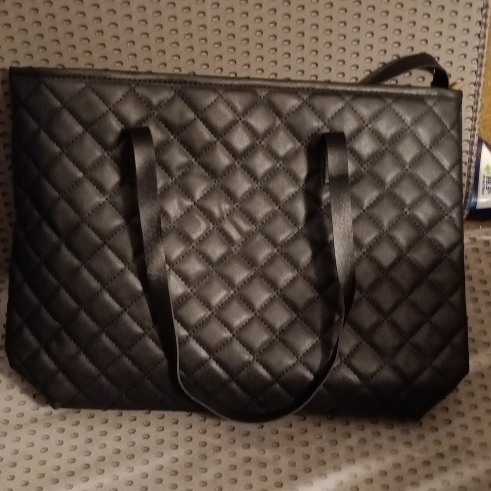 Large black Quilted Tote bag. Nwot. Never used. 16 inch × 11.